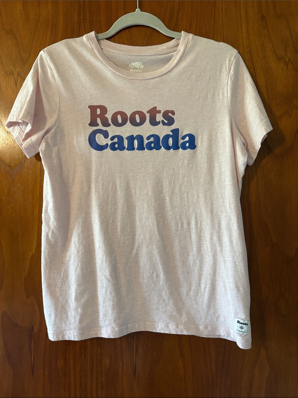 Roots Women’s Light Pink Tee with Two‑Tone Logo